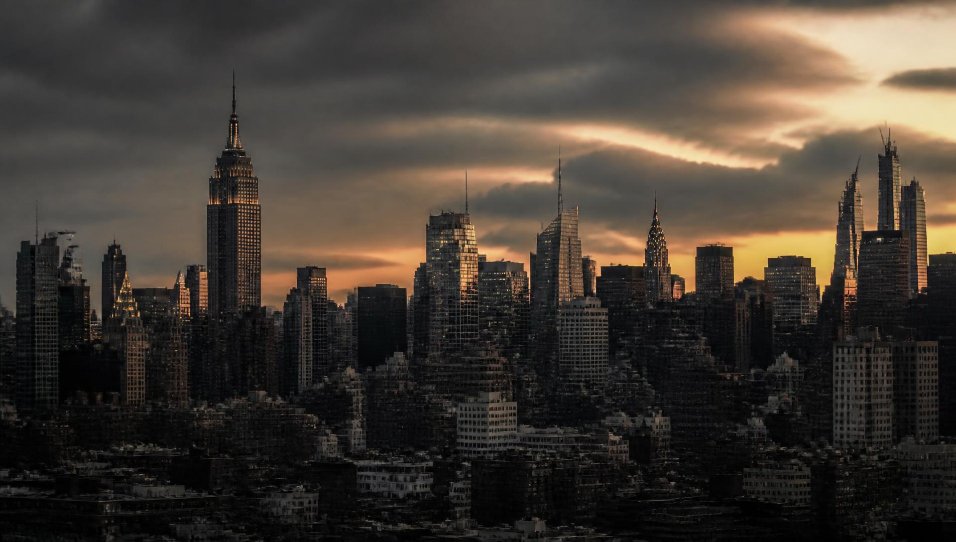 Manhattan skyline at dusk seen across midtown New York